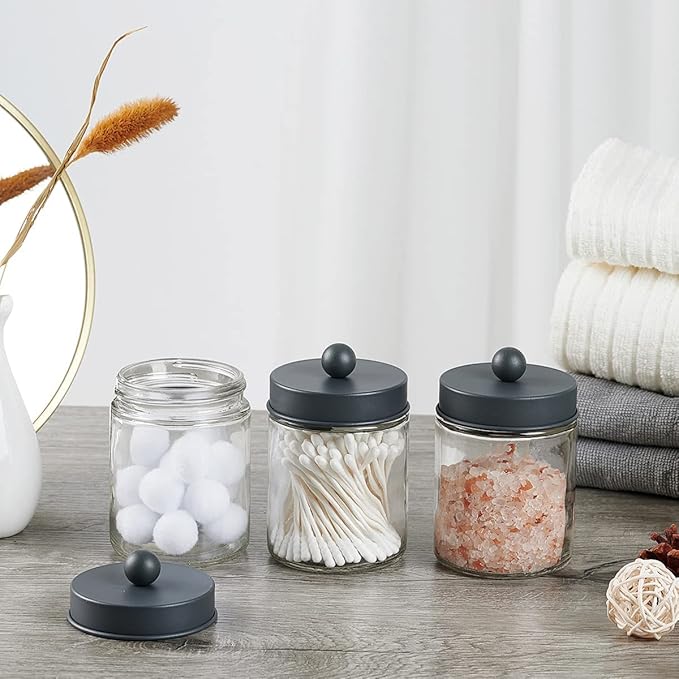 Amolliar 4 Pack Apothecary Jars Bathroom Vanity Storage Organizer Set -Countertop Canister with Stainless Steel Lids &Cute Stickers - Qtip Dispenser Holder for Qtips,Cotton Swabs,Makeup Sponges (Grey)