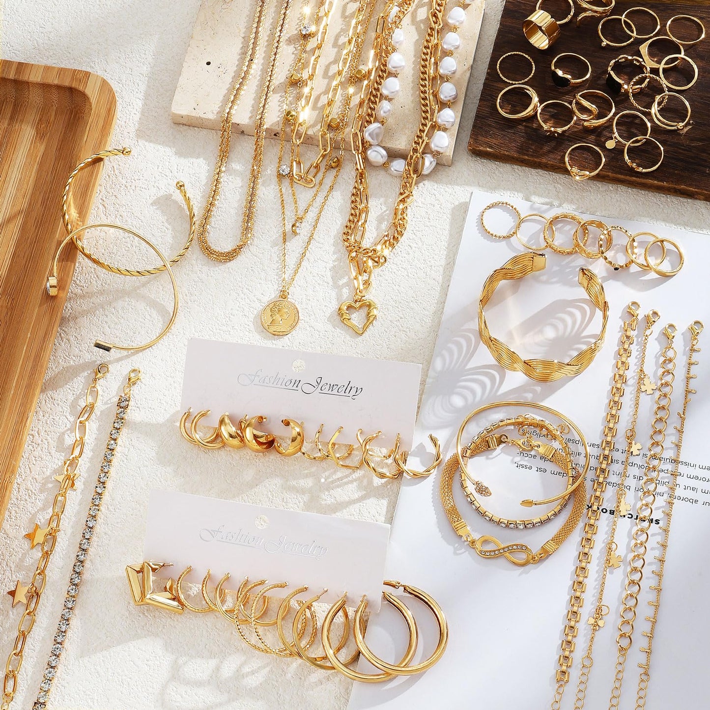59 Pcs(8 Pack) Gold Plated Jewelry Set For Women With 8 Necklace 12 Bracelet 27 Ring 12 Pair Earring Hoop Simple Sparkle For Happy
