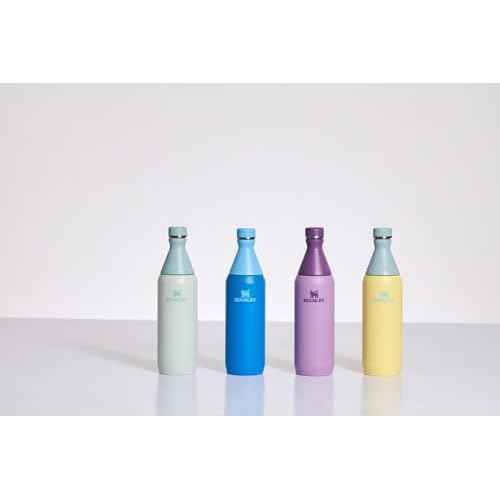 Stanley All Day Slim Bottle 20 oz | Twist On Lid with Leakproof Seal | Slim Design for Travel & Gym | Insulated Stainless Steel | BPA-Free | Lilac