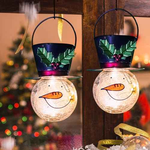 Starsoul 2 Pack Snowman Solar Lanterns, Christmas Outdoor Hanging Lantern Waterproof Decorative Snowman Lights Decor for Garden, Patio, Yard, Porch, Xmas Holiday Party Decor (Large Leaves)