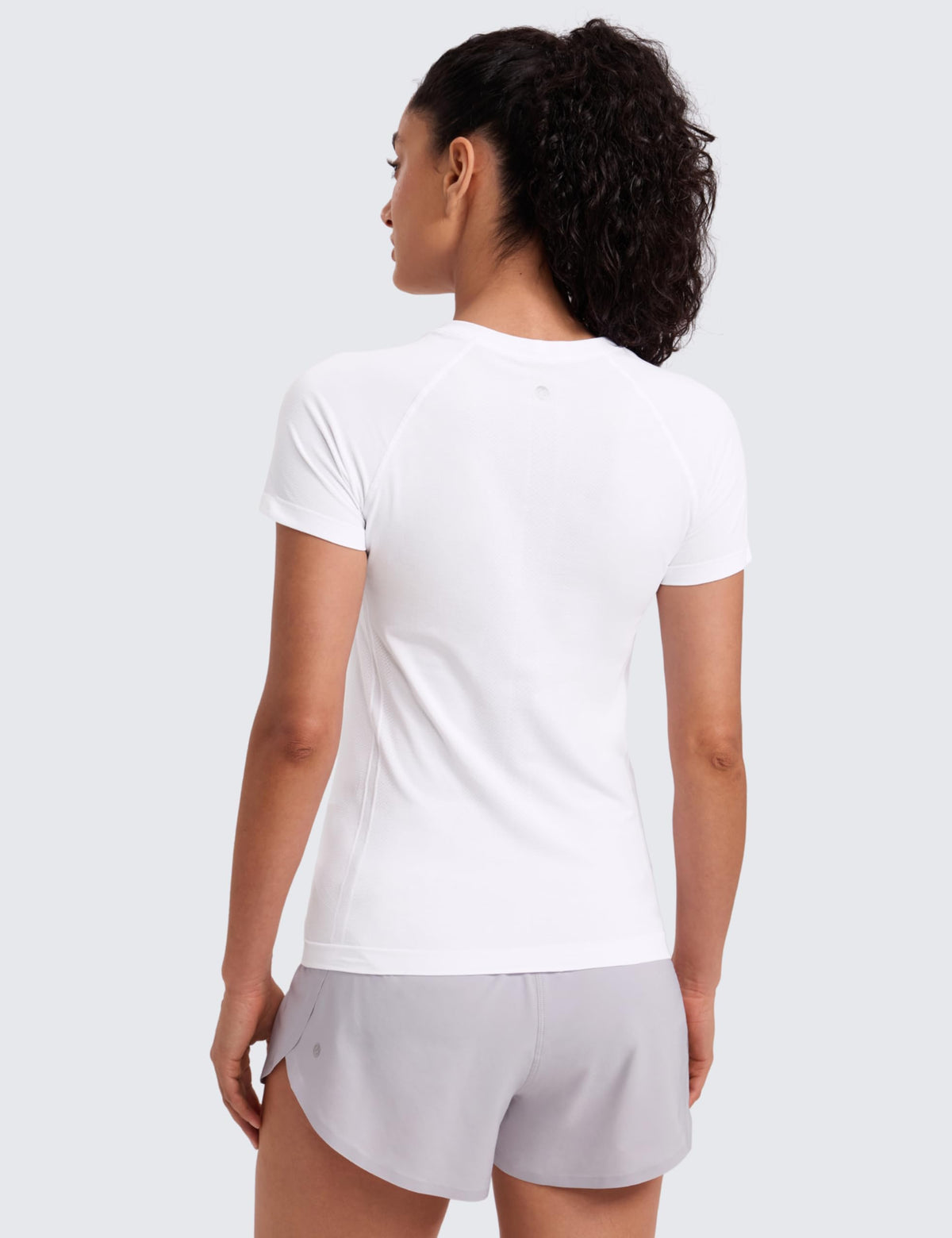 CRZ YOGA Seamless Workout Tops for Women Hip Length - Athletic Running Gym Yoga Short Sleeve Shirts Breathable Crewneck Tees White XX-Small