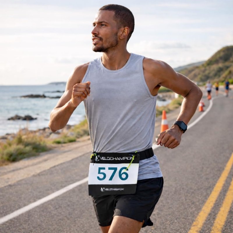 VeloChampion Lightweight Running Belt Waist Pack for Men Women - Elasticated Stretch Fit Race Number Holder - No Pins - 3 Sizes - Run. Triathlon. Cycle. Marathon. Jogging (1, Large)