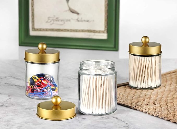 Amolliar 4 Pc Glass Apothecary Jars - Countertop Qtip Dispenser Holder with Stainless Steel Lids &Cute Stickers -Bathroom Vanity Storage Organizer Set for Qtips,Cotton Swabs,Makeup Sponges(Gold)