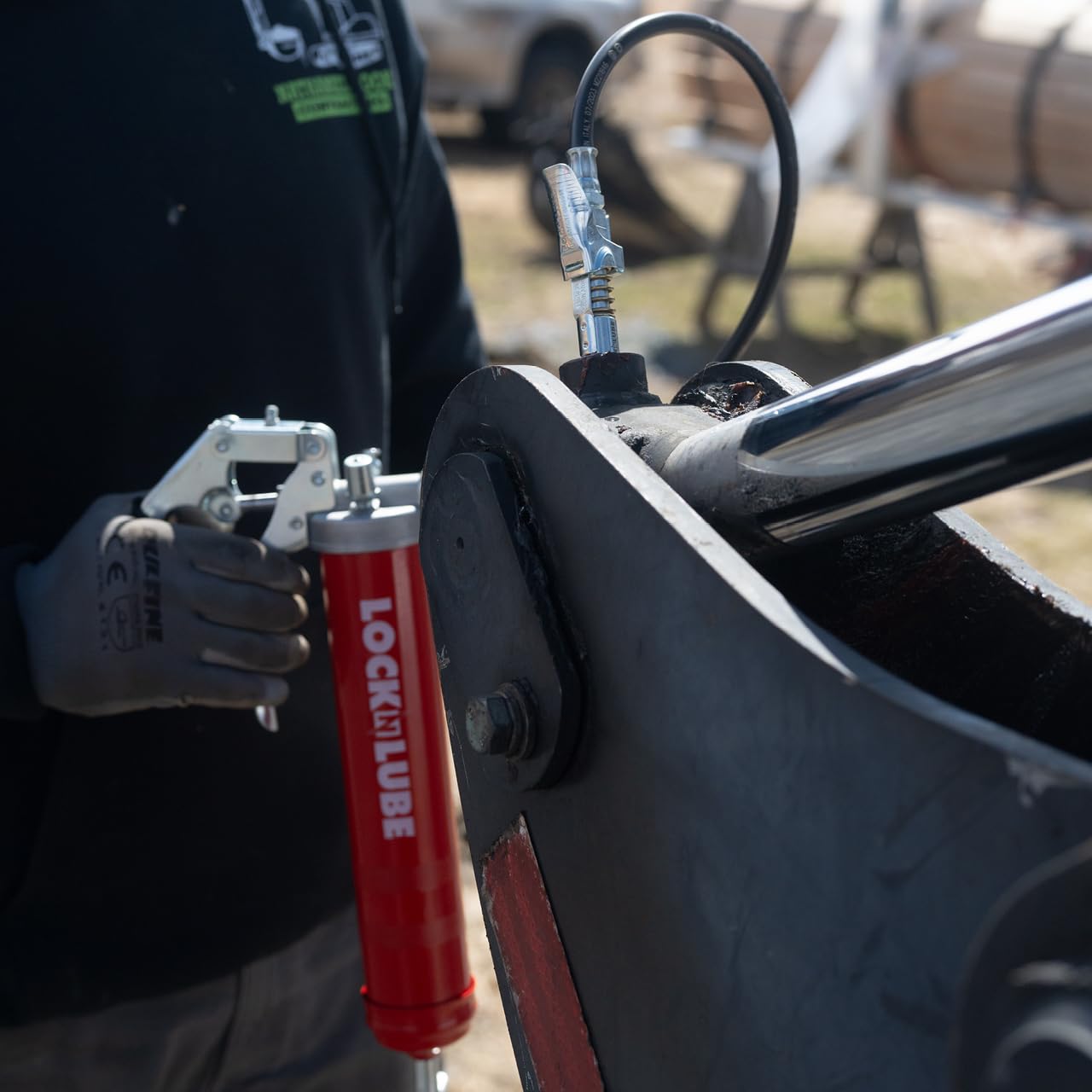 LockNLube Heavy-Duty Pistol Grip Grease Gun. Includes our patented LockNLube® Grease Coupler (Locks On, Stays On, Won't Leak!) plus a high-quality 20" hose and in-line hose swivel