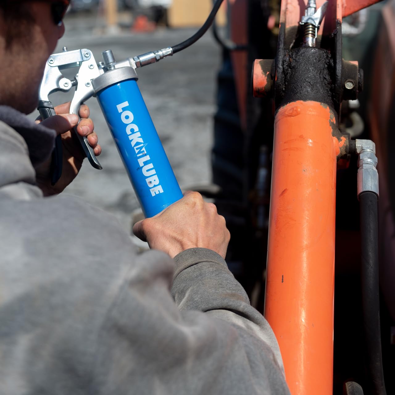LockNLube Heavy-Duty Pistol Grip Grease Gun. Includes our patented LockNLube® Grease Coupler (Locks On, Stays On, Won't Leak!) plus a high-quality 20" hose and in-line hose swivel