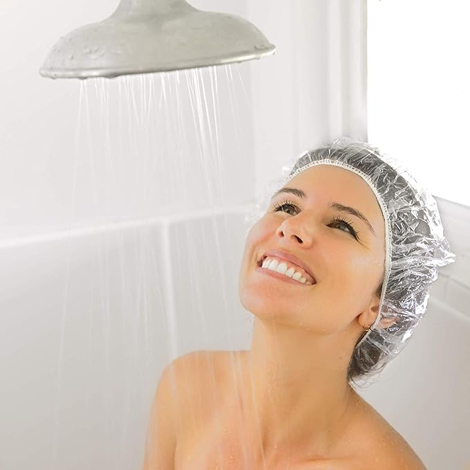 Auban 100PCS Disposable Shower Caps Independent Packing, Plastic Clear Hair Cap Large Thick Waterproof Bath Caps for Women, Travel Essentials Accessories (20.5")