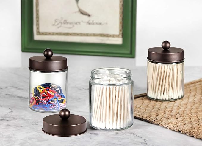 Amolliar 4 Pc Glass Apothecary Jars - Countertop Qtip Dispenser Holder with Stainless Steel Lids&Cute Stickers -Bathroom Vanity Storage Organizer Set for Qtips,Cotton Swabs/Rounds (Bronze)