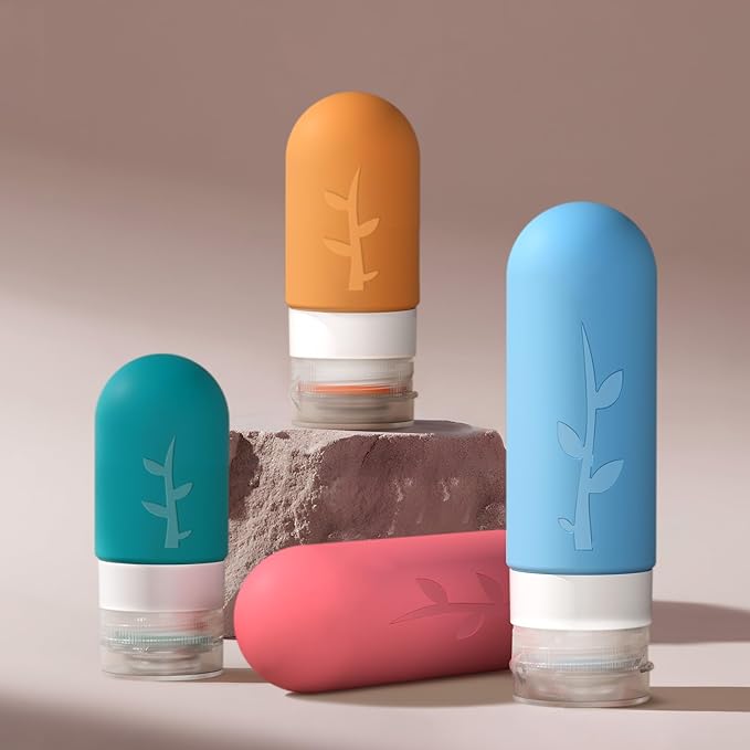 Travel Bottles Kit (16 Pack) - TSA Approved, Leak Proof Silicone Squeezable Containers for Toiletries. Complete Set with Jars, Sprayers & Bag (Coastal Hues)