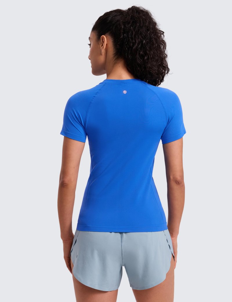 CRZ YOGA Seamless Workout Tops for Women Hip Length - Athletic Running Gym Yoga Short Sleeve Shirts Breathable Crewneck Tees Sparkle Blue XX-Small