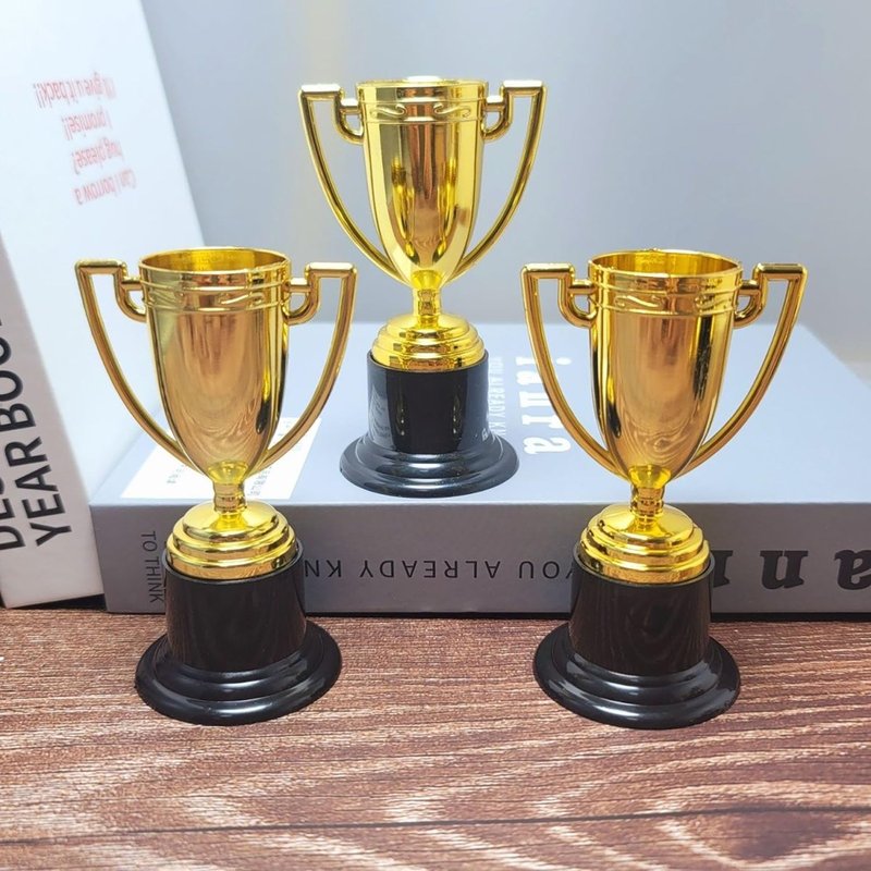 YYaaloa 12 Pack Mini Trophies Plastic Gold Award Trophy Cups 4 Inch for Awards for Party Favors, Props, Rewards, Winning Prizes Props,Sports Tournaments,Competitions (12 Pack)