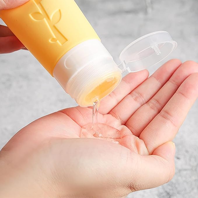 Travel Bottles Kit (16 Pack) - TSA Approved, Leak Proof Silicone Squeezable Containers for Toiletries. Complete Set with Jars, Sprayers & Bag (White)