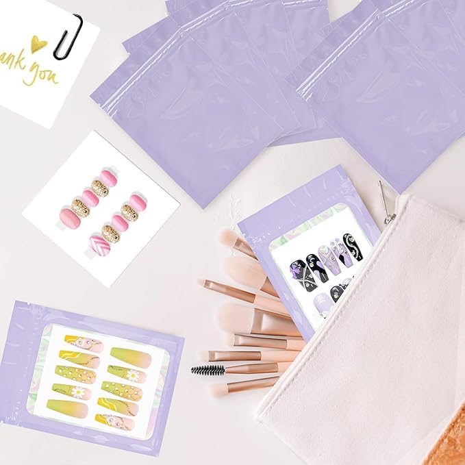 100PCS Empty Solid Purple Holographic Nail Storage Bag Press on Nail Packaging Bag and 100PCS Shiny white cardboard Nail Tips Packaging Bags with 1 Roll Transparent Tape
