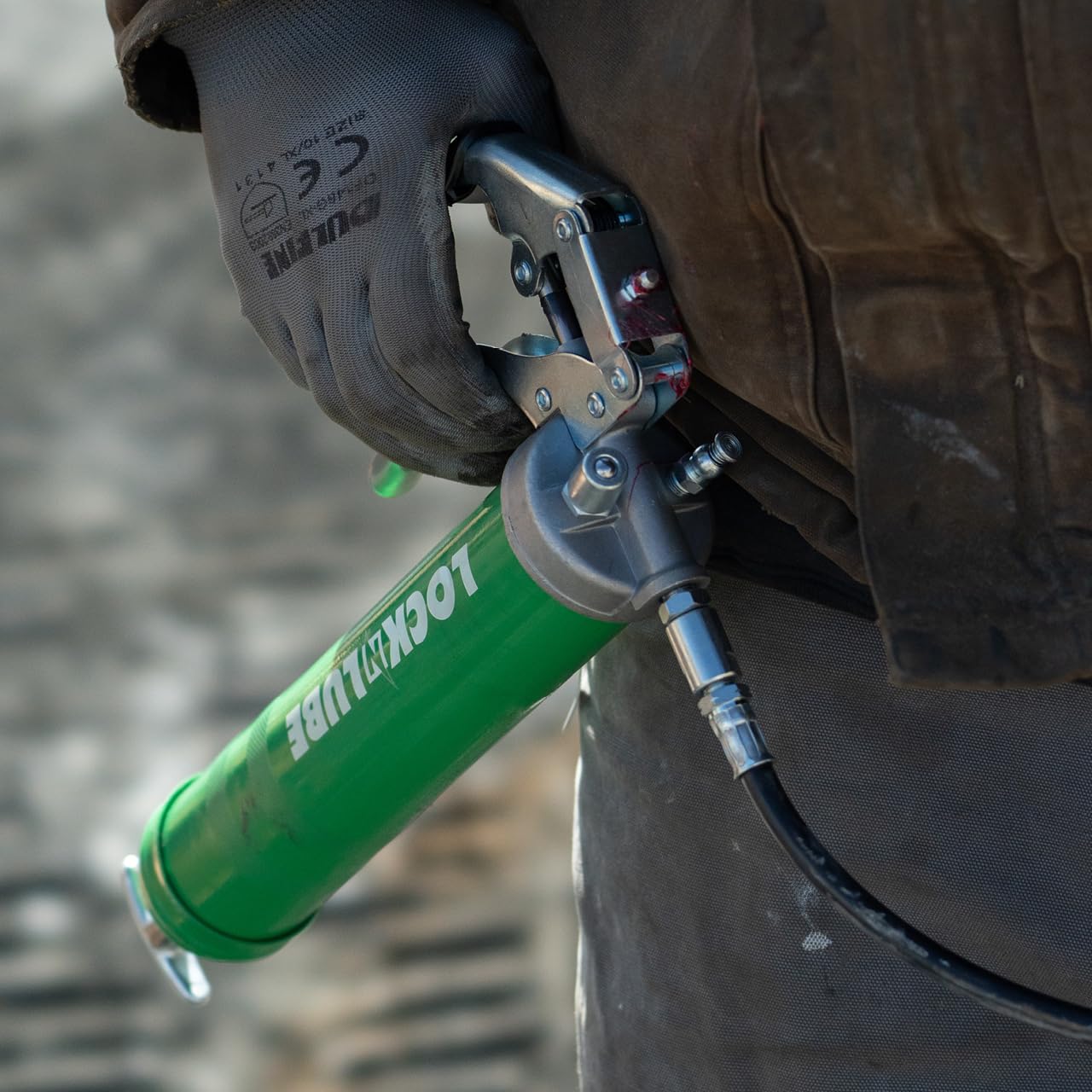 LockNLube Heavy-Duty Pistol Grip Grease Gun. Includes our patented LockNLube® Grease Coupler (Locks On, Stays On, Won't Leak!) plus a high-quality 20" hose and in-line hose swivel