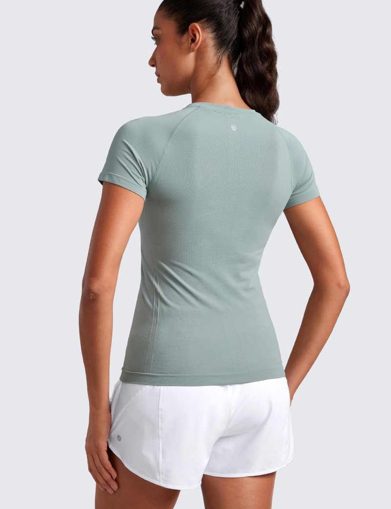 CRZ YOGA Seamless Workout Tops for Women Hip Length - Athletic Running Gym Yoga Short Sleeve Shirts Breathable Crewneck Tees Green Palm Court XX-Small