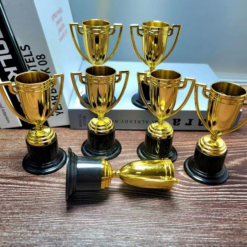 YYaaloa 12 Pack Mini Trophies Plastic Gold Award Trophy Cups 4 Inch for Awards for Party Favors, Props, Rewards, Winning Prizes Props,Sports Tournaments,Competitions (12 Pack)