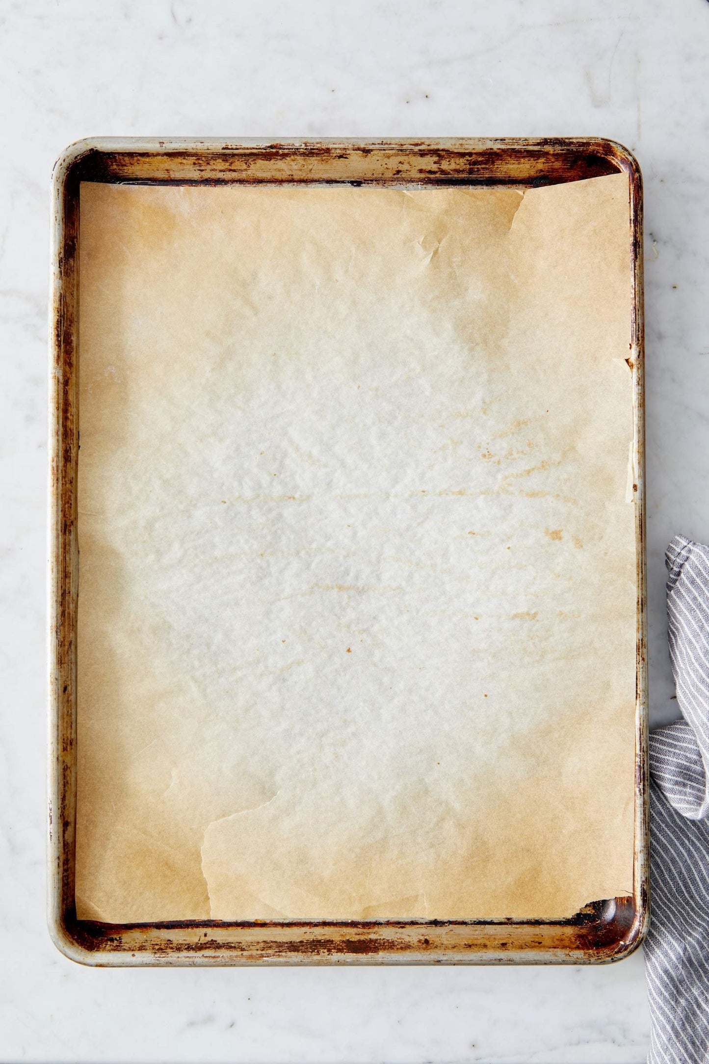 King Arthur Professional-Grade Pre Cut Parchment Paper Sheets for Baking: 100 Count, Nonstick, Reusable, Heavy-Duty, Fits 18 x 13 in Pan, Silicone-Coated, USA-Made Baking Supplies